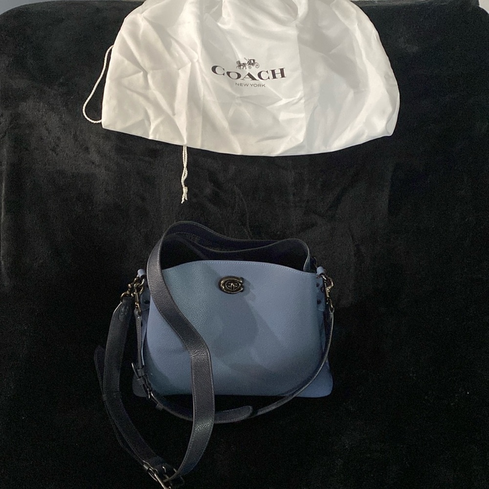 LN Coach bag. Blue w/ 2 navy straps, adjustable with removable cross body strap